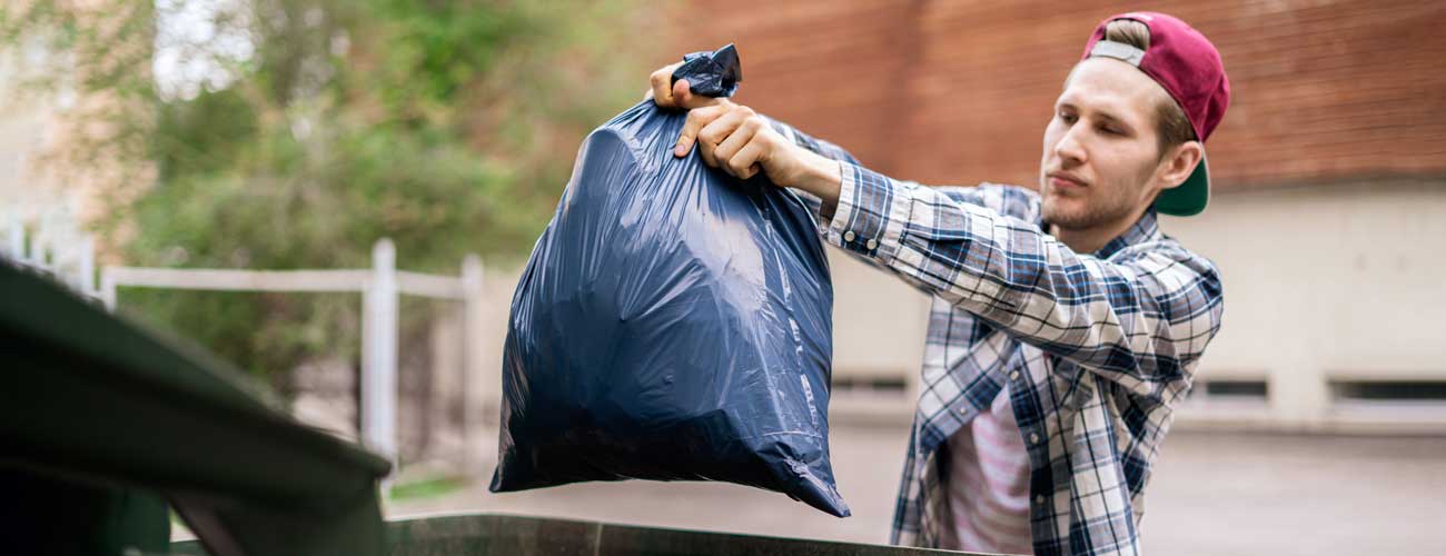 Man throwing out food after bed bugs