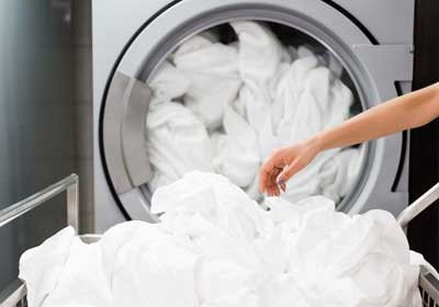 Washing bedding and clothing to get rid of bed bugs