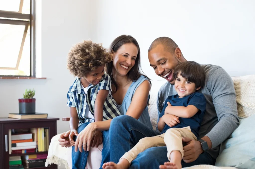 Happy family on a couch.